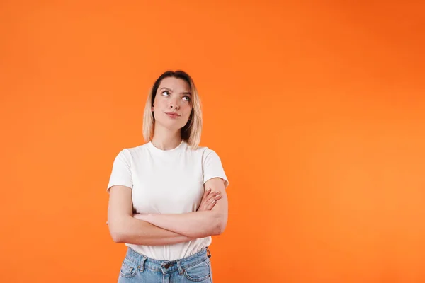 Image Beautiful Displeased Woman Posing Hands Crossed Isolated Orange Background — Stock Photo, Image