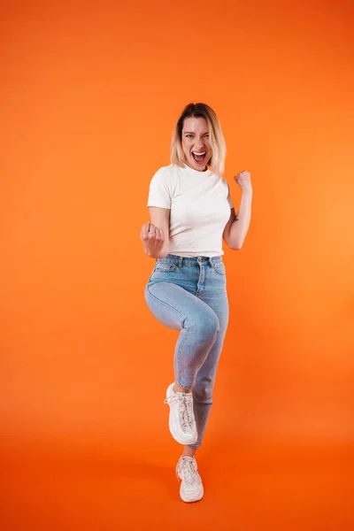 Image Excited Attractive Woman Smiling Making Winner Gesture Isolated Orange — Stock Photo, Image