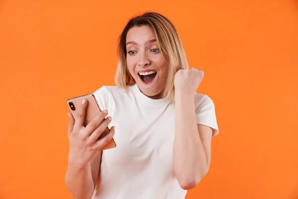 Image Delighted Woman Making Winner Gesture While Using Mobile Phone — Stock Photo, Image