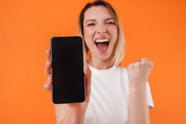 Image Excited Woman Making Winner Gesture While Showing Mobile Phone — Stock Photo, Image