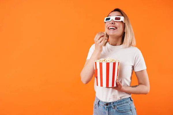 Image Laughing Woman Glasses Watching Movie Eating Popcorn Isolated Orange — Stock Photo, Image