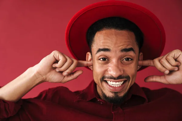 Image African Positive Young Man Posing Isolated Red Wall Background — Stock Photo, Image