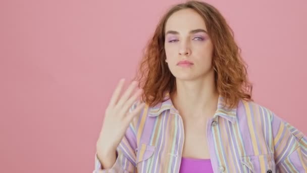 Beautiful Young Woman Showing Hot Weather Standing Isolated Pink Background — Stock Video