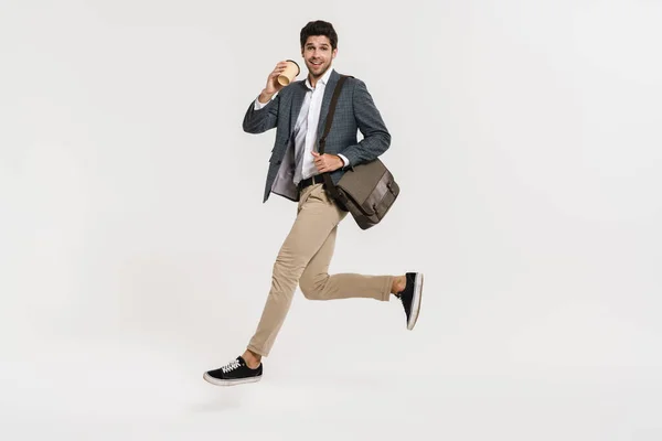 Photo Cheerful Caucasian Businessman Drinking Coffee While Running Bag Isolated — Stock Photo, Image