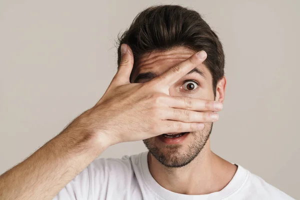 Portrait Shocked Man Covering His Face While Expressing Surprise Camera — Stock Photo, Image
