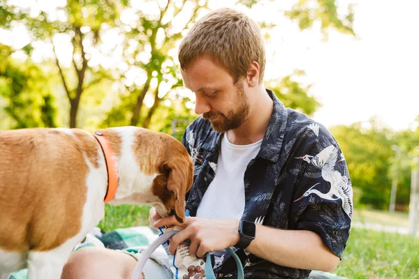 Image Young Caucasian Bearded Man Playing His Beagle Dog While — Stock Photo, Image