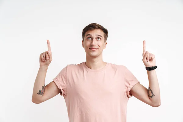 Image Positive Young Man Basic Shirt Smiling Pointing Fingers Upward — Stock Photo, Image