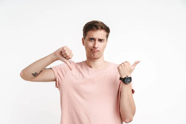 Image Dissatisfied Caucasian Man Basic Shirt Showing Thumb Pointing Finger — Stock Photo, Image
