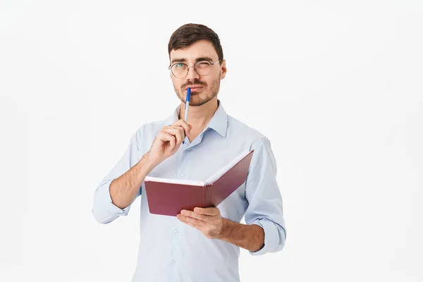 Photo Thinking Handsome Man Eyeglasses Making Notes Diary Isolated White — Stock Photo, Image