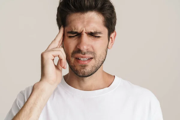 Image Unhappy Young Man Headache Rubbing His Temple Isolated White — Stock Photo, Image