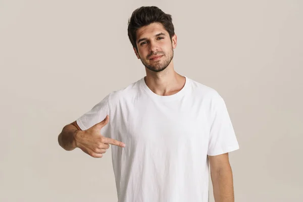 Image Confident Young Unshaven Man Pointing Finger Himself Isolated Beige — Stock Photo, Image
