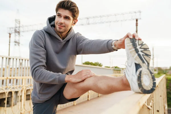 Image Pleased Caucasian Sportsman Earphones Doing Exercise While Working Out — Stock Photo, Image