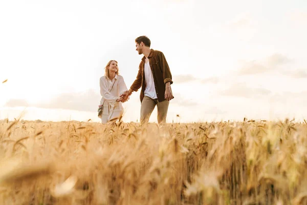 Image Young Caucasian Beautiful Couple Walking Together Golden Field Countryside — Stock Photo, Image