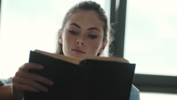 Cropped View Young Woman Reading Her Book Sitting Home — Stock Video