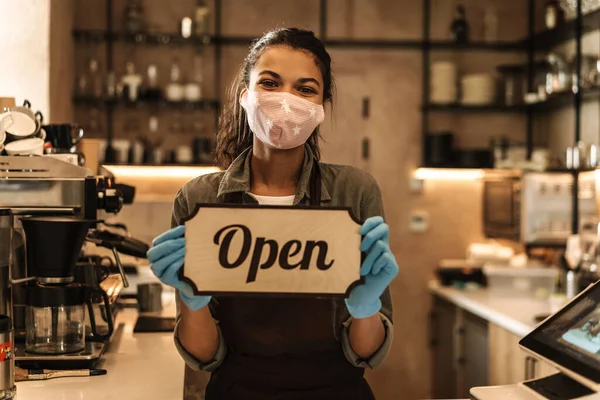 Happy Woman Barista Wearing Medical Mask Showing Open Sign While — Stock Photo, Image