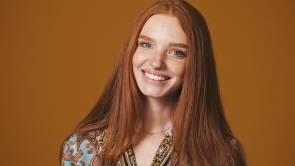 Pleased Young Woman Winking Camera Standing Isolated Brown Background — Stock Video