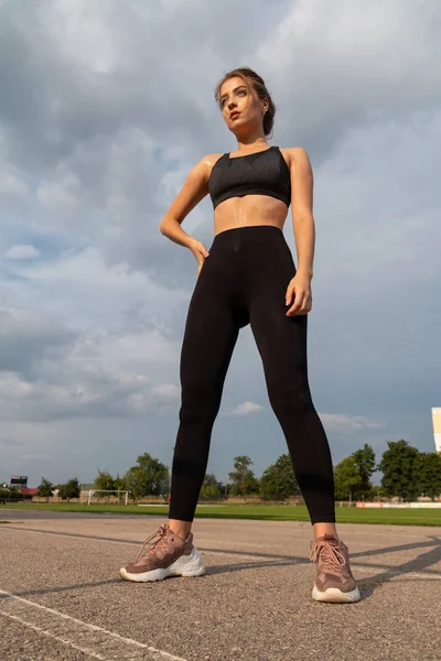 Wet sexy athletic girl after training Stock Photo by ©Milogrodskiy 300486740