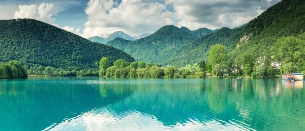 stock image Wide panoramic view over Most na Soci, lake and mountains,Slovenia.