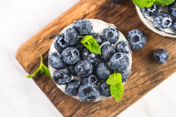 Blueberry cheesecake with mint, top view