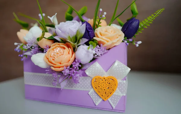 Bouquet of flowers from soap in a box
