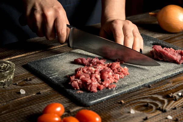 Cook Hands Cut Red Meat Board Nearby Tomatoes Onion Butter — Stock Photo, Image