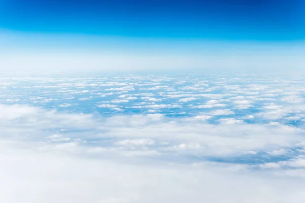 stock image Top view of white clouds above the ground or water