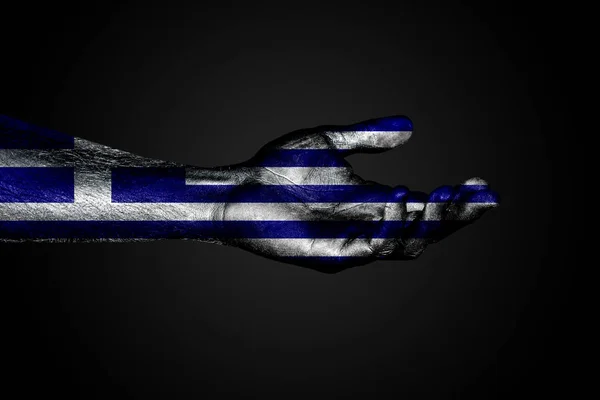 Utsträckt hand med en dragen Grekland flagga, ett tecken på hjälp eller en begäran, på en mörk bakgrund. — Stockfoto