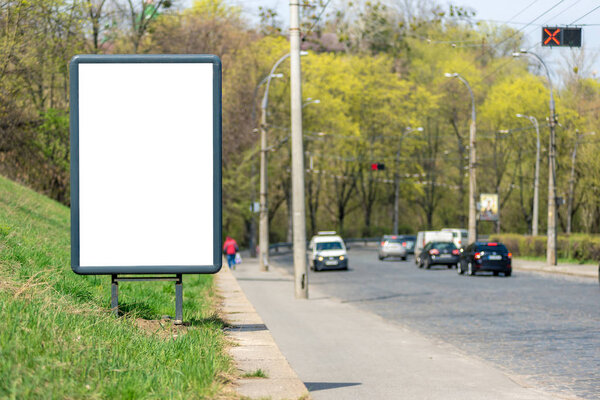 Vertical blank white billboard with place for text or mock up.