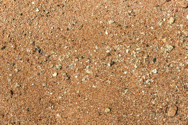 Vista superior da praia de areia. Fundo com espaço de cópia e textura de areia visível . — Fotografia de Stock