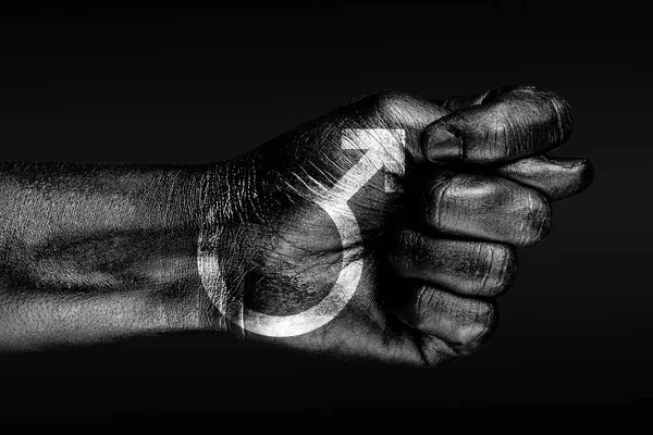 Una mano con un segno dipinto maschio, mostra un fico, un segno di aggressione, disaccordo, una disputa su uno sfondo scuro . — Foto Stock