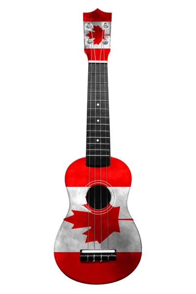 Hawaiianische Nationalgitarre, Ukulele, mit bemalter Kanada-Flagge, auf weißem, isoliertem Hintergrund, als Symbol der Volkskunst oder als Nationallied. — Stockfoto