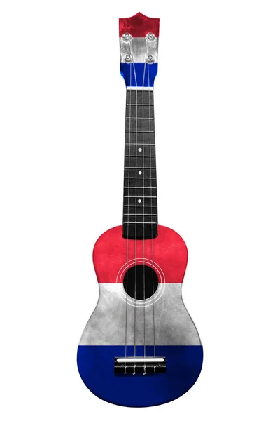 Guitarra nacional hawaiana, ukelele, con una bandera de Francia pintada, sobre un fondo blanco aislado, como símbolo del arte popular o una canción nacional . —  Fotos de Stock