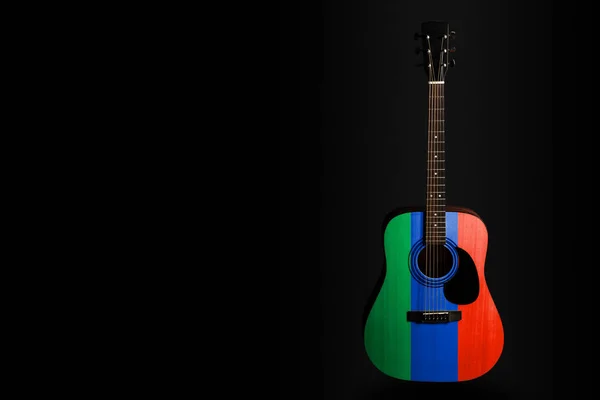 Acoustic concert guitar with a drawn flag Dagestan, on a dark background, as a symbol of national creativity or folk song. — Stock Photo, Image