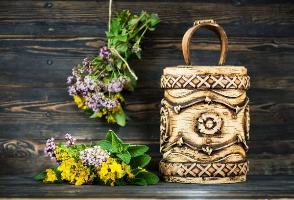 Healing herbs and flowers in birch bark boxes. Organic Medicinal Products. Herbal medicine.