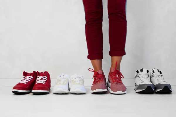 Sporty Girl Chooses Which Sneakers Training Several Pairs Sports — Stock Photo, Image