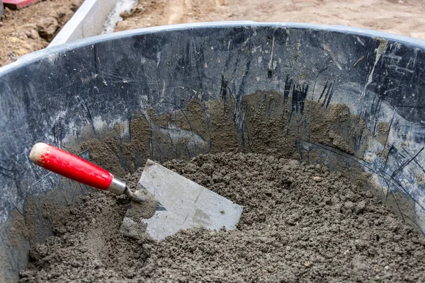 Bucket Full Earth Moist Concrete Red Trowel Close — Stock Photo, Image