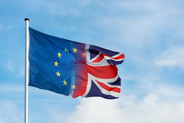 Merging European British Flag Front Blue Sky Symbol Brexit — Stock Photo, Image