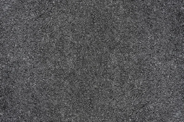 Grey concrete asphalt street floor with grainy texture as background