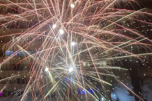 New Year\'s salute in the city yard, at night