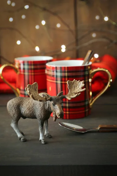 Small Toy Moose Mugs Rustic Background Stock Image