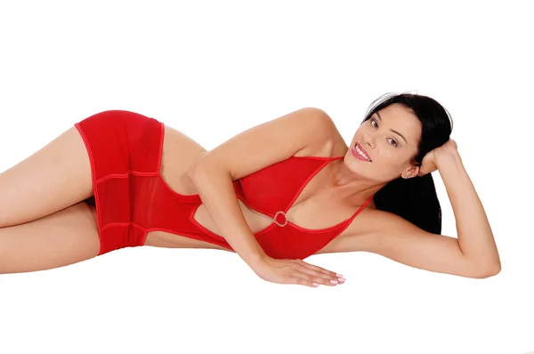 Vacker Smal Ung Kvinna Liggande Rött Underkläder Golvet Wit — Stockfoto