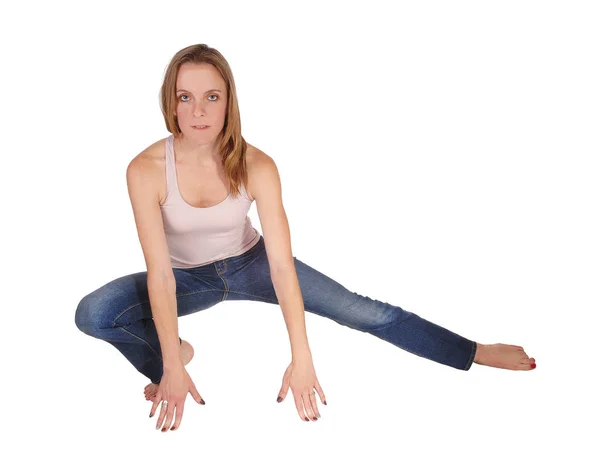 Slim Young Woman Jeans Pink Top Crouching Floo — Stock Photo, Image
