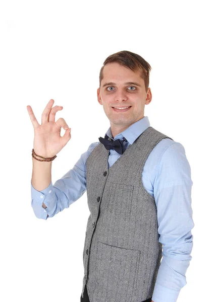 Sonriente hombre feliz haciendo una señal con su mano, OK — Foto de Stock