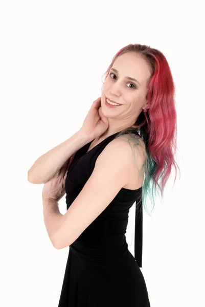 Young woman standing in a black dress waist up — Stock Photo, Image