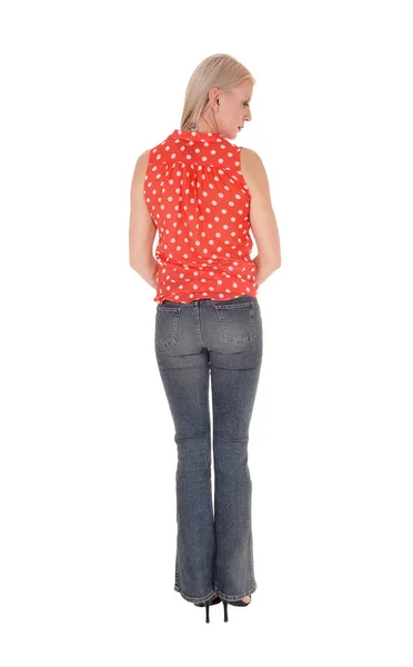 A slim middle age woman standing from the back — Stock Photo, Image