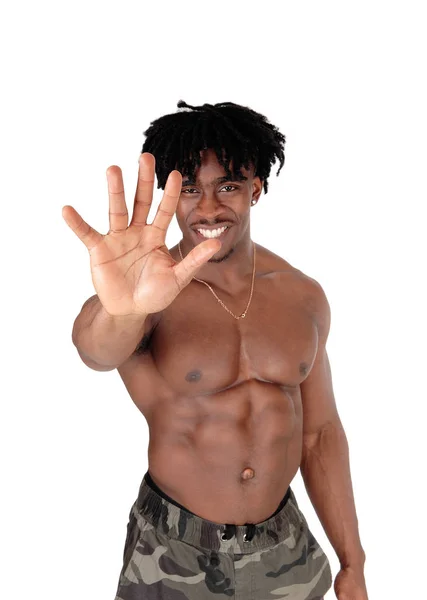 Smiling black man holding hand up saying no — Stock Photo, Image