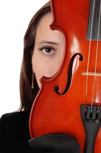 Close up of a woman hiding behind a violin — Stock Photo, Image