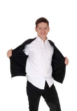 Young teen boy standing holding his jacket open