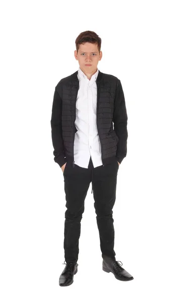Serious young teenager boy standing in the studio — Stock Photo, Image
