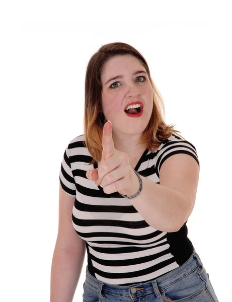 Young woman shouting and pointing finger — Stock Photo, Image